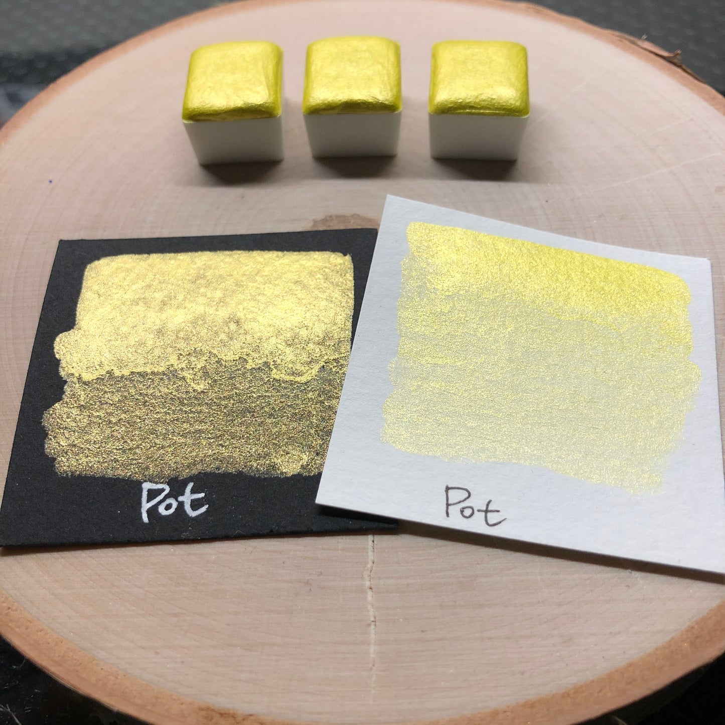 Pot yellow watercolor paints half pan