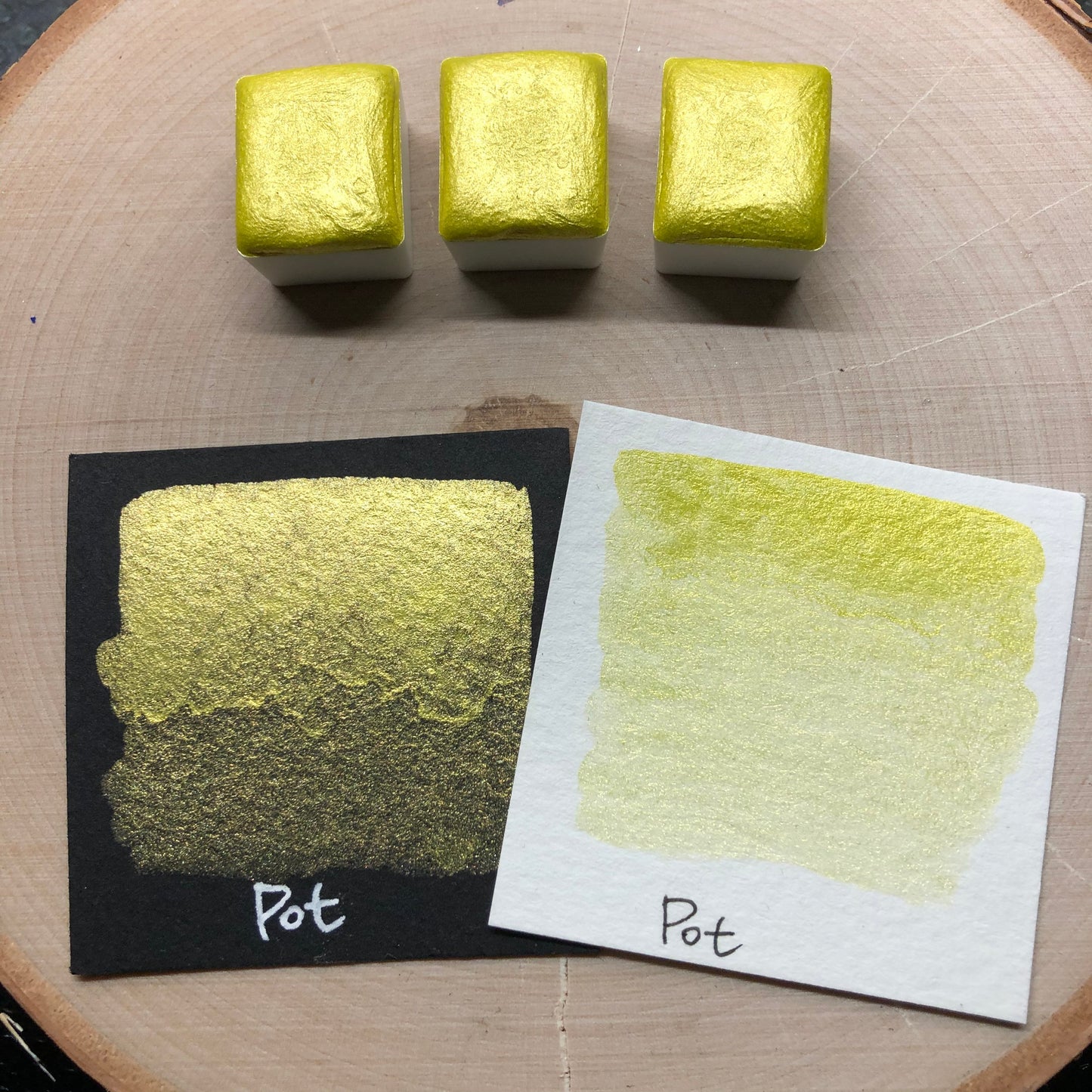 Pot yellow watercolor paints half pan