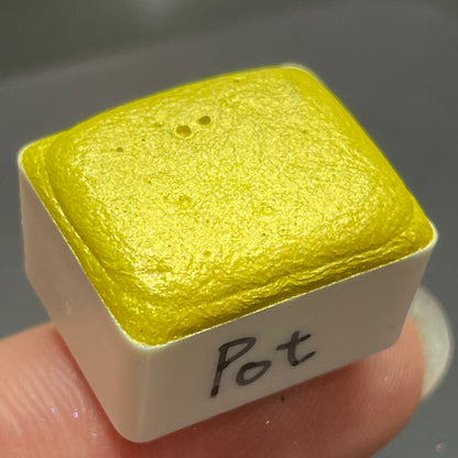 Pot yellow watercolor paints half pan
