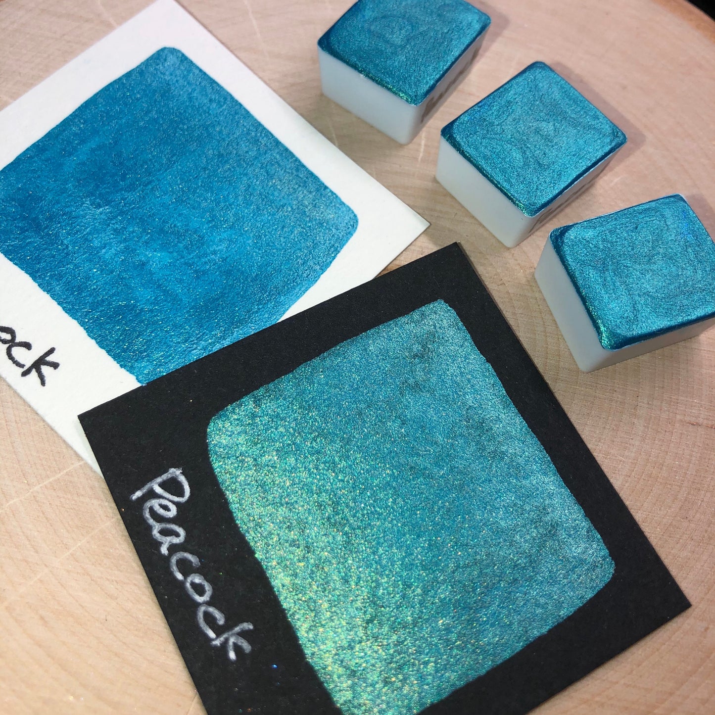 Peacock teal watercolor paints half pans