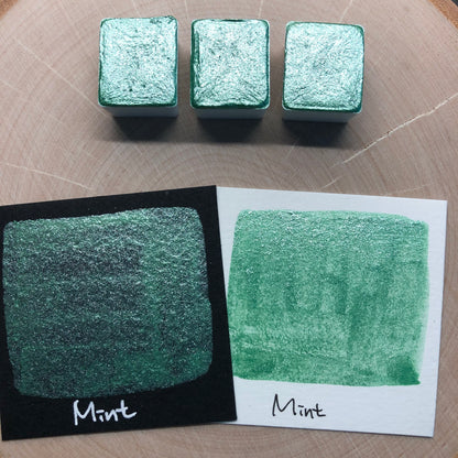 Mint teal watercolor paints half pan