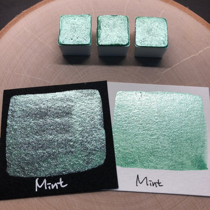 Mint teal watercolor paints half pan