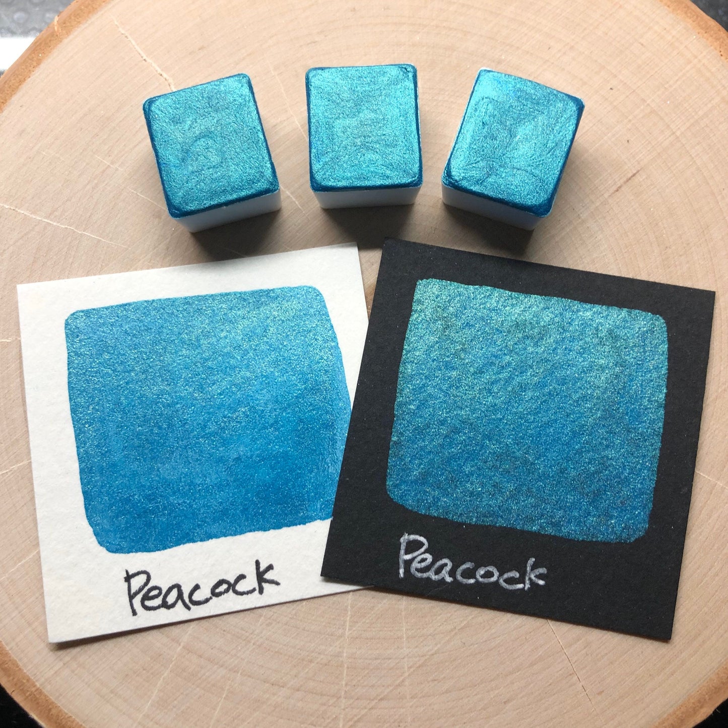 Peacock teal watercolor paints half pans