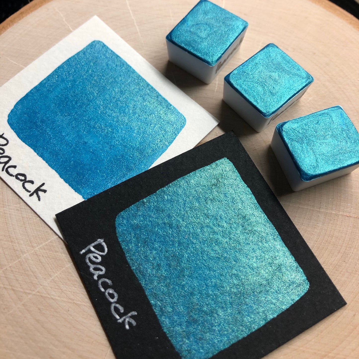 Peacock teal watercolor paints half pans